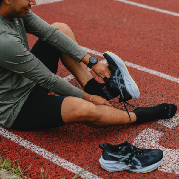 Man putting on shoes