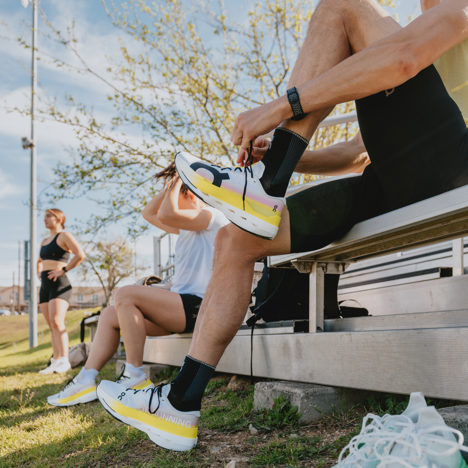 Group of runners on bleachers