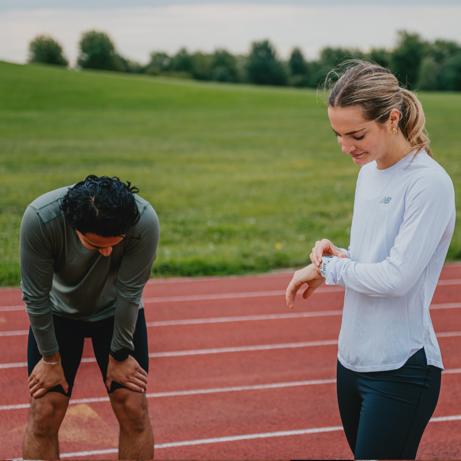 Man and woman on a track