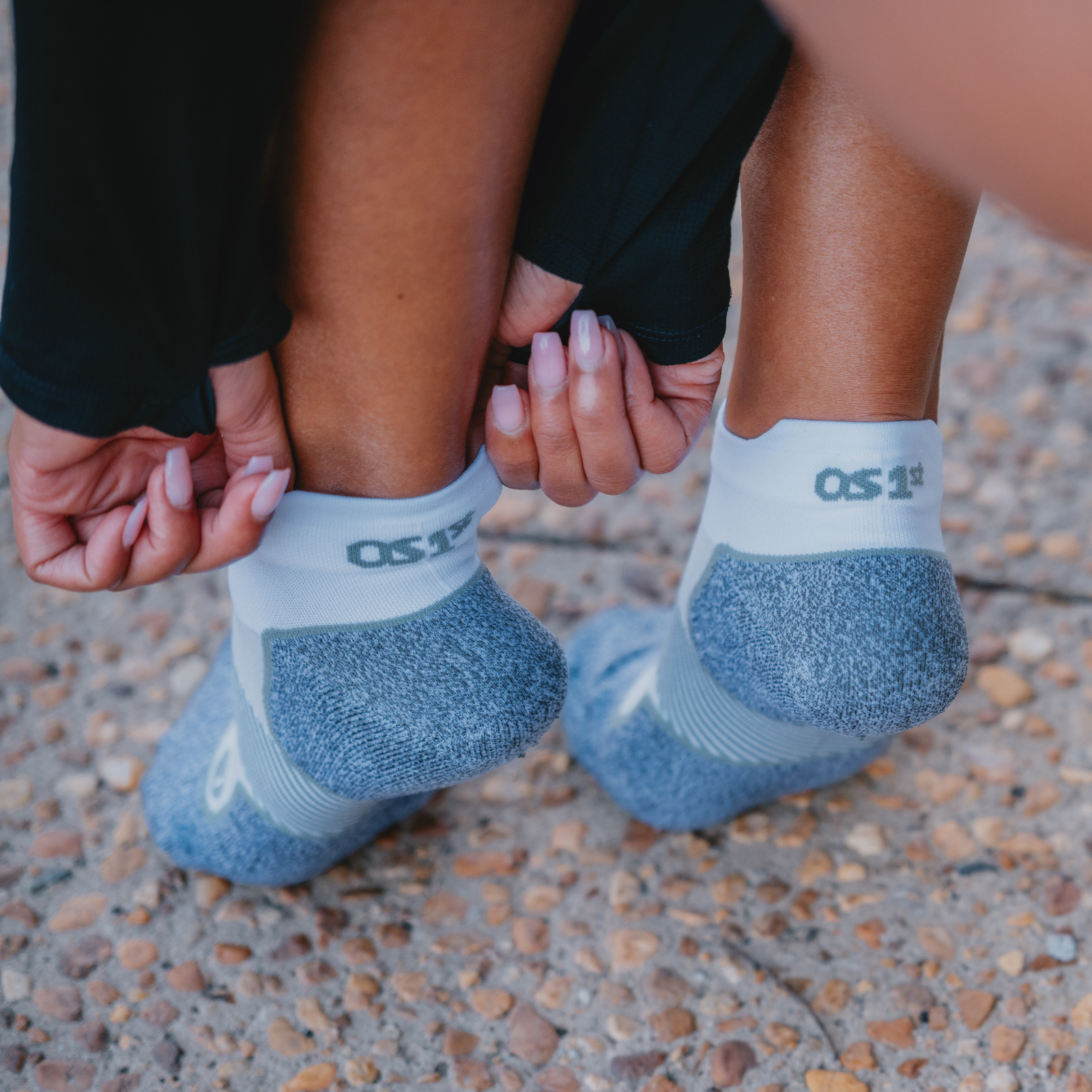 Woman putting on socks