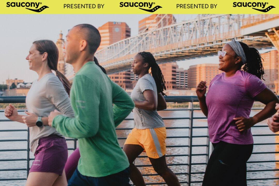 Group of runners next to water
