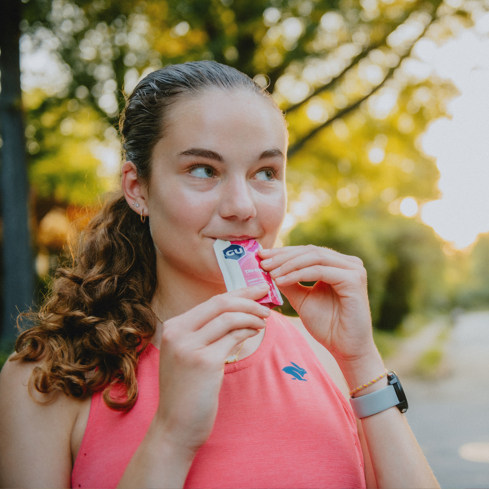 Runner eating GU gel