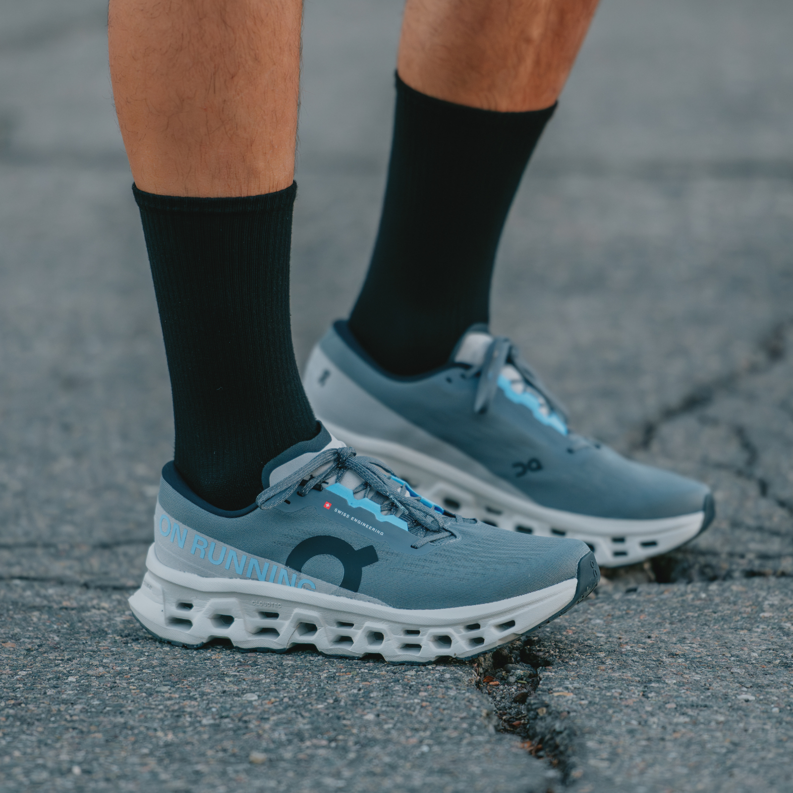 Man wearing On Cloudmonster 3 shoes