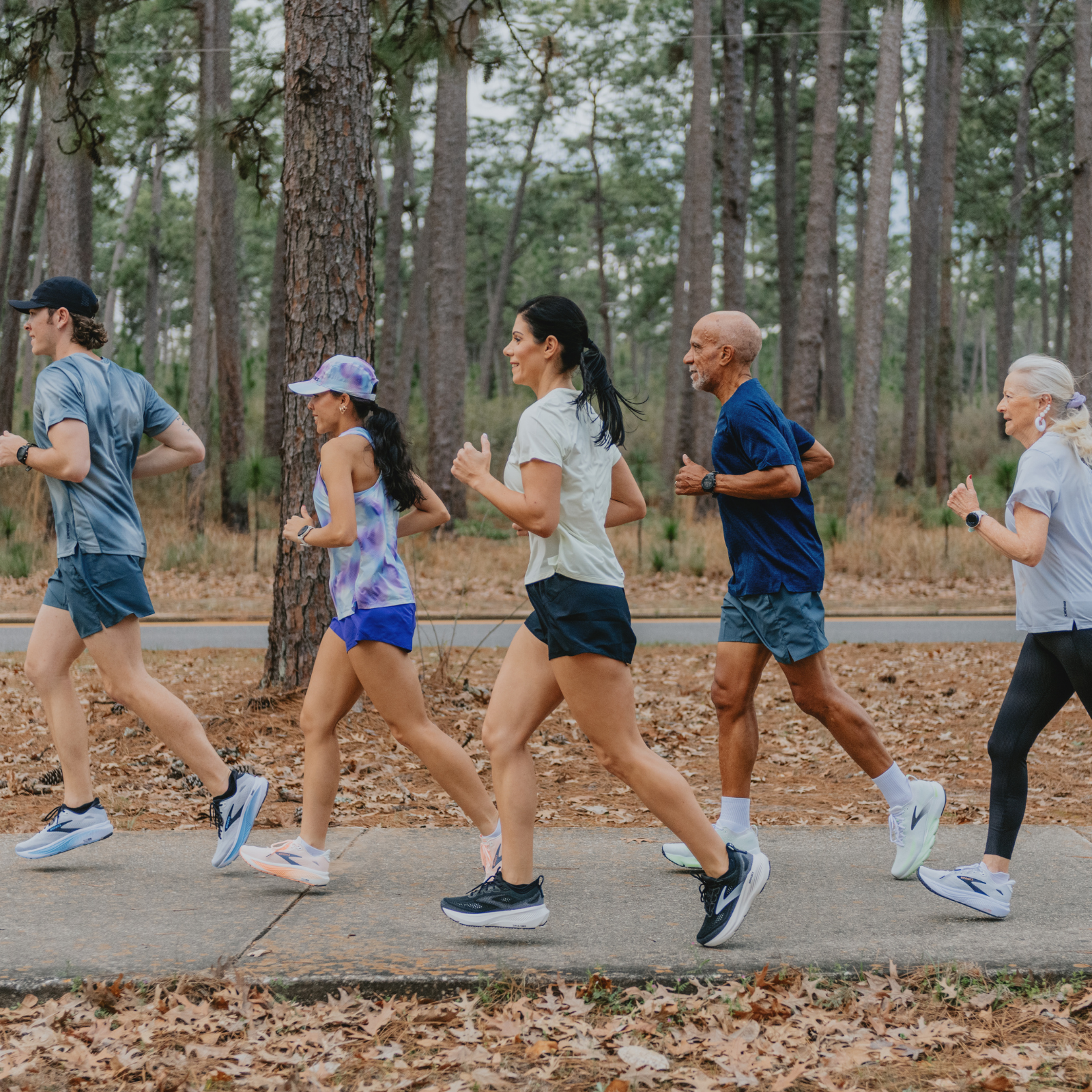 A group of runners wearing Brooks