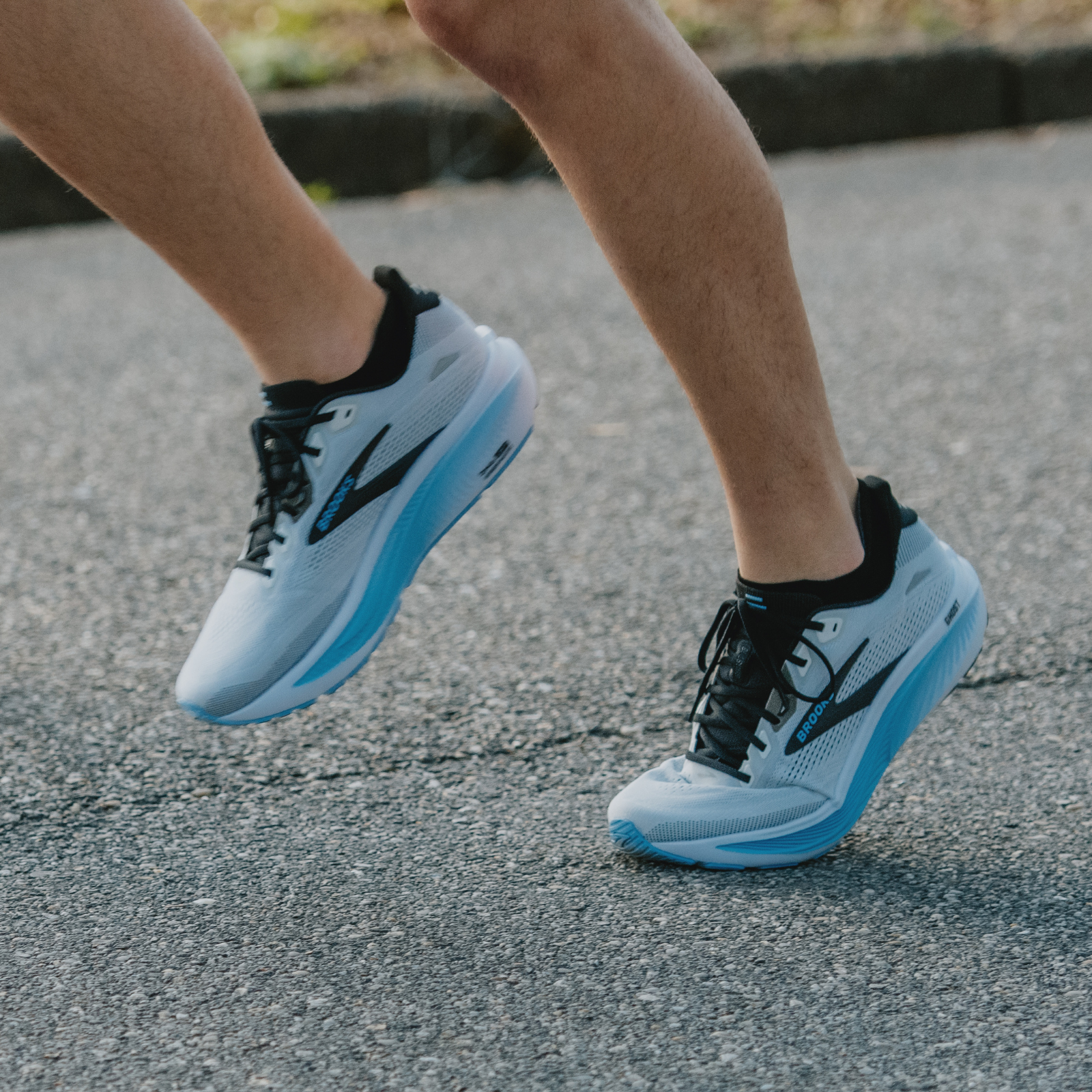 Man running in Brooks Ghost 18 shoes