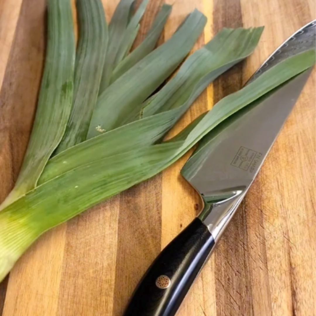 F.N. Sharp Chef's Knife With Sliced Pork Chop