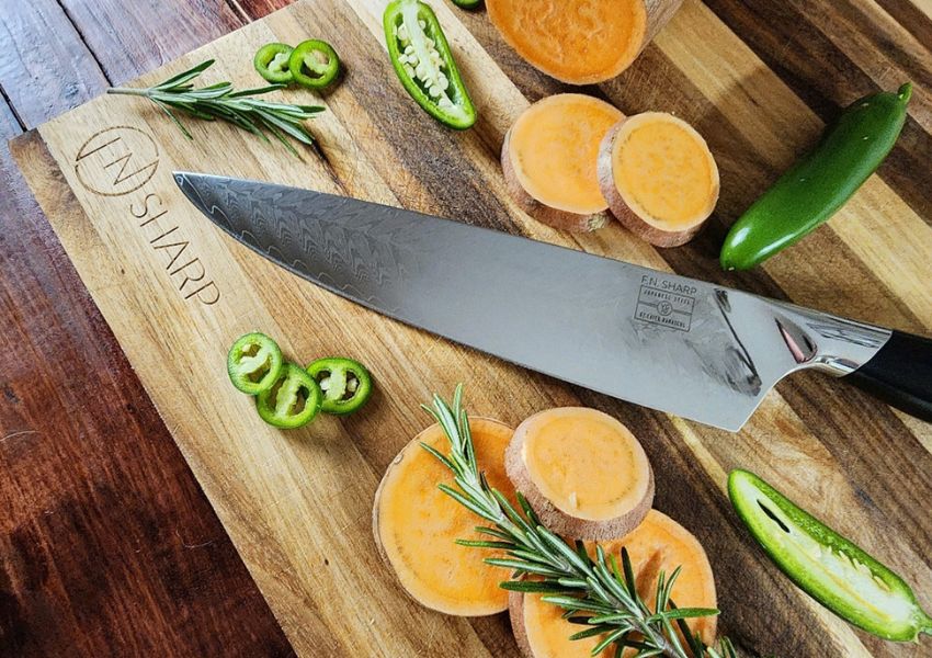 F.N. Sharp Chef's Knife on Acacia Wood Cutting Board