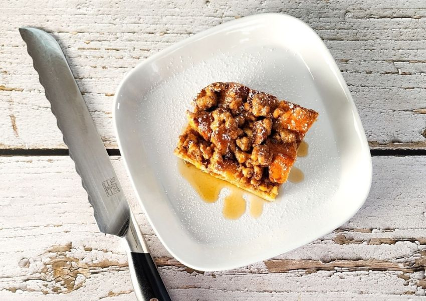 F.N. Sharp Bread Knife With Sliced of French Toast Bread Pudding Casserole