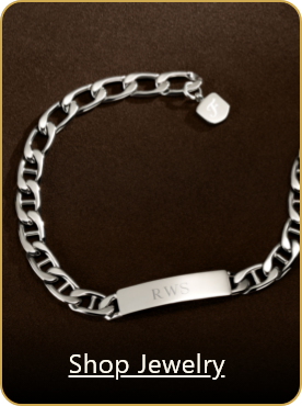 Image of a Fossil mens silver bracelet with on-image text that reads 'Shop Jewelry'.