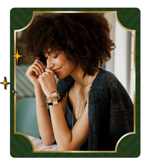 Happy woman wearing a Fossil watch that she had on her wishlist.