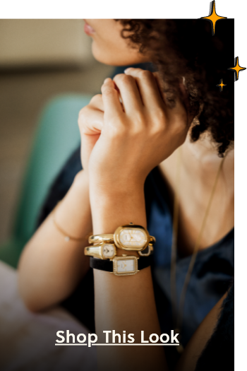 Woman’s arms upright on table showing stack of gold bangle watches and black velvet sparkle watch, with “Shop the Look” call to action
