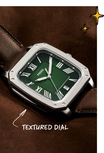 Angled close-up of brown leather strap watch with silver case and green dial, arrow pointing to dial labeled Textured Dial