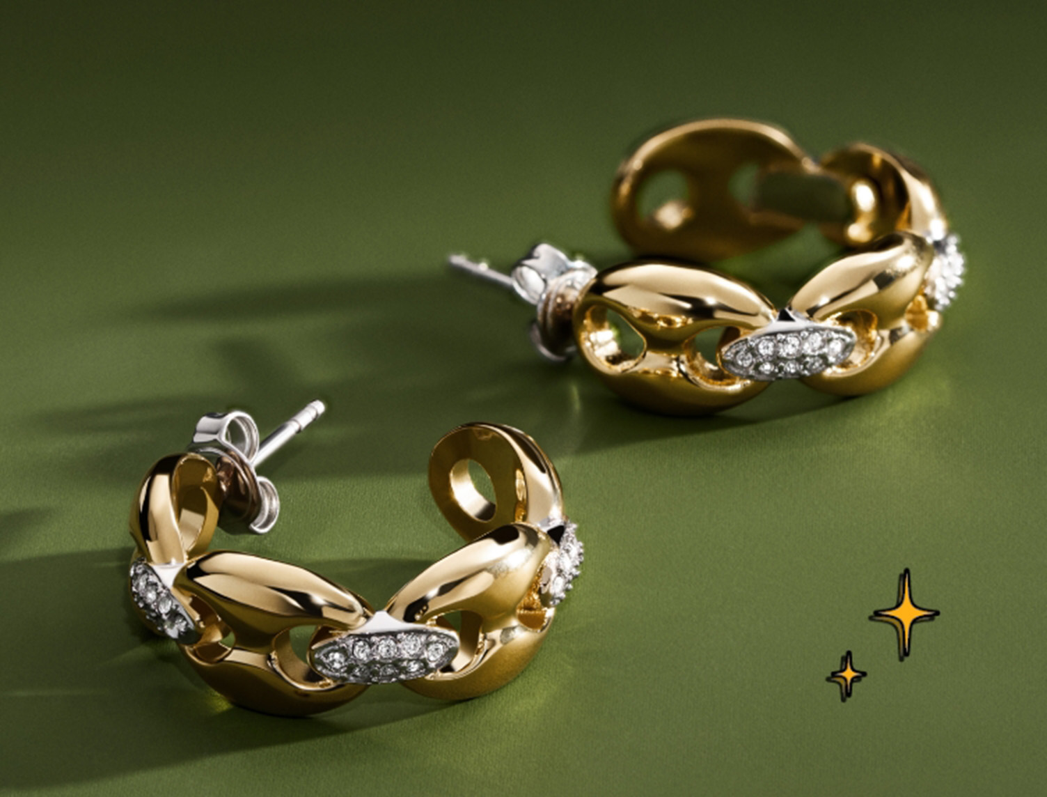 Dark green background with holiday cues and closeup of new pavé crystal and gold link earrings