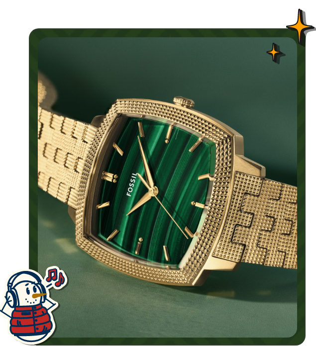 Close-up of Nick Jonas Gold watch with green malachite dial, framed by snowman and sparkles graphics with text “Gifts For Him”