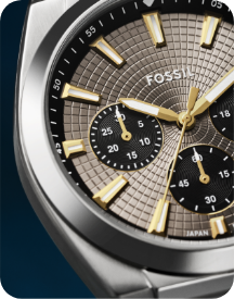 Close-up of Fossil Everett watch with silver case and textured dial