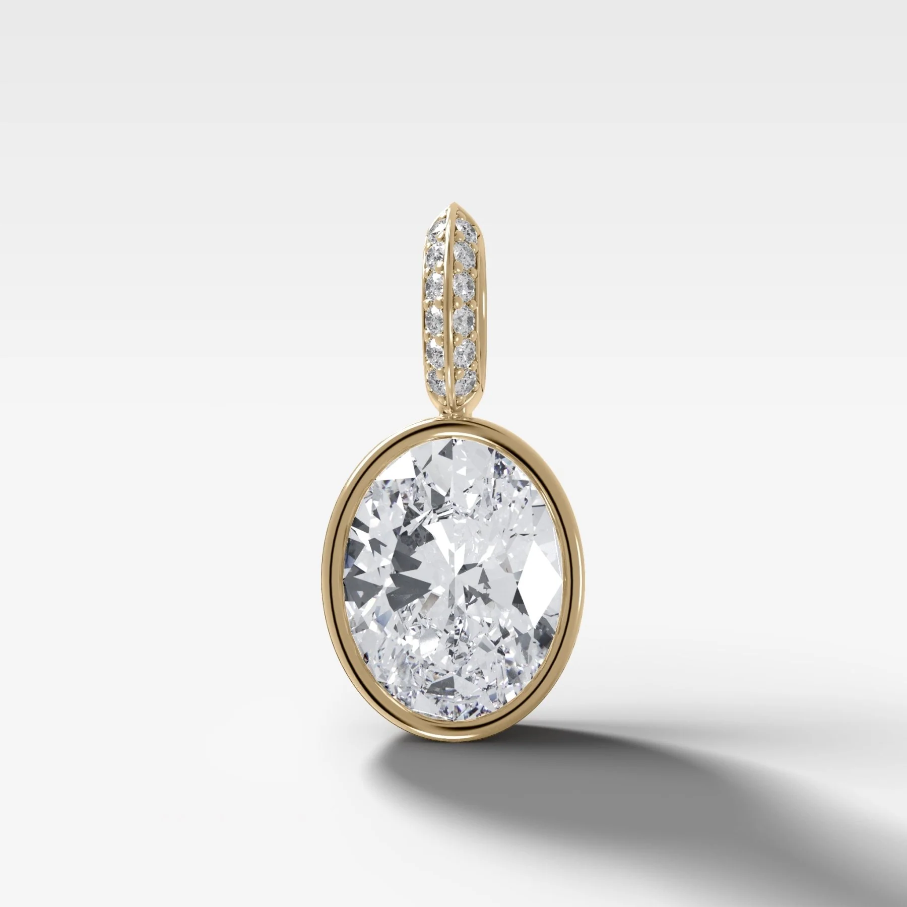Image of Bezel Set Oval Attachable Diamond Pendant with Pavé Knife Edge Diamond Bail