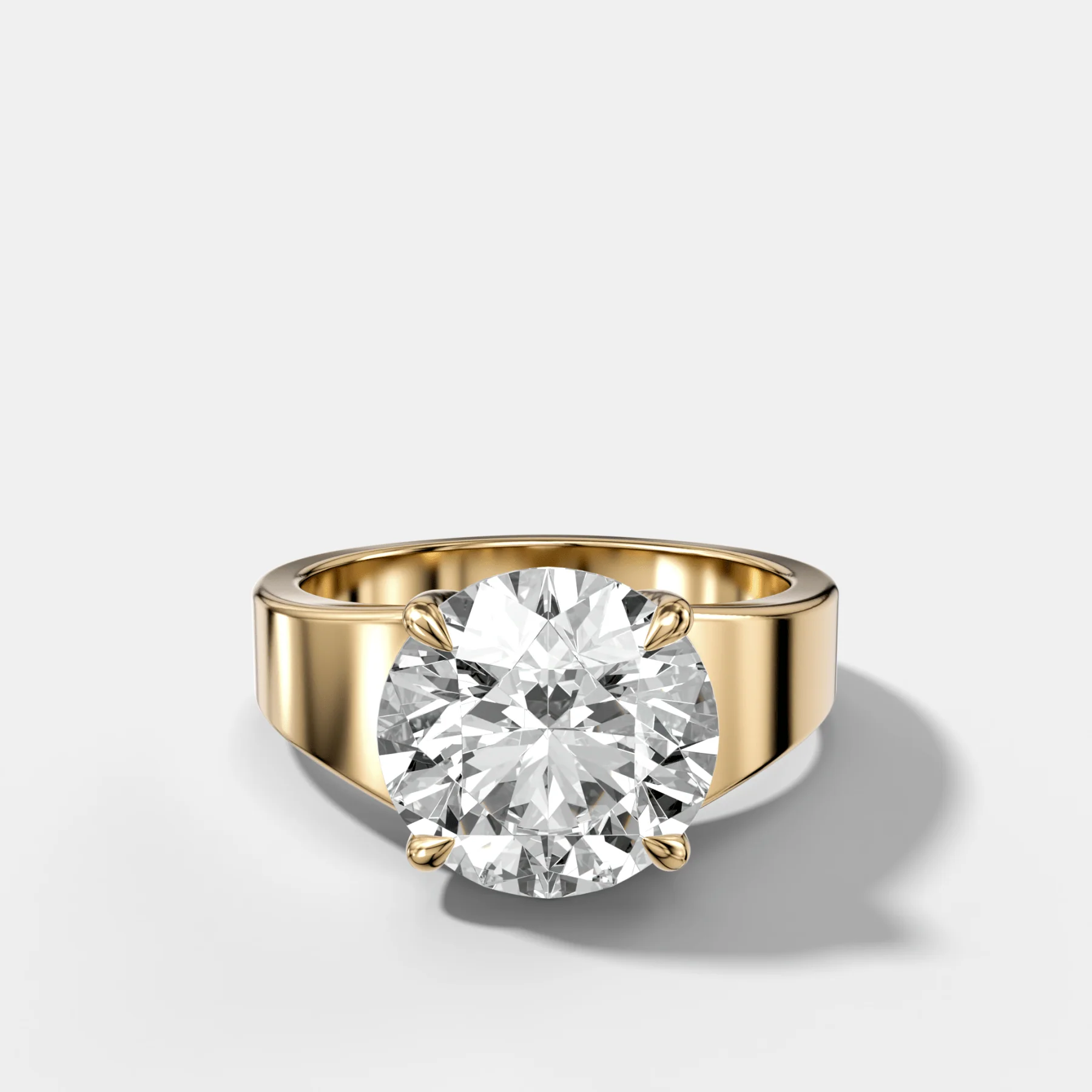 Image of Finest Tapered Engagement Ring With Round Cut Diamond