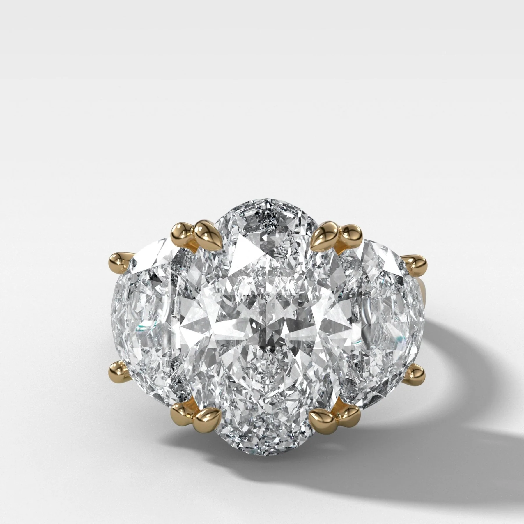 Image of Jumbo Three Stone ring with Half Moon sides & an Oval Cut