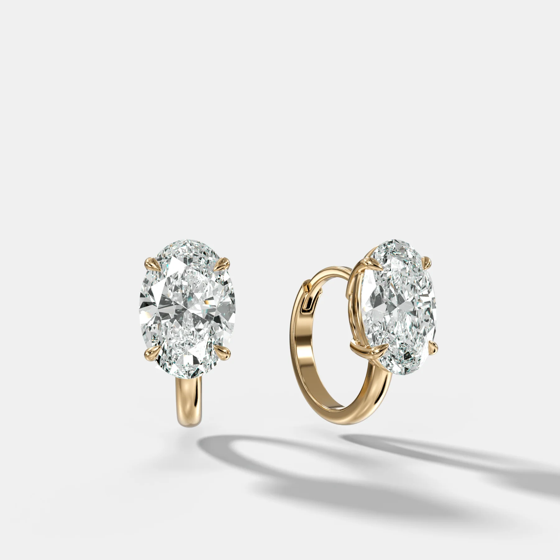 Image of Floating Huggie with Oval Cut Diamonds