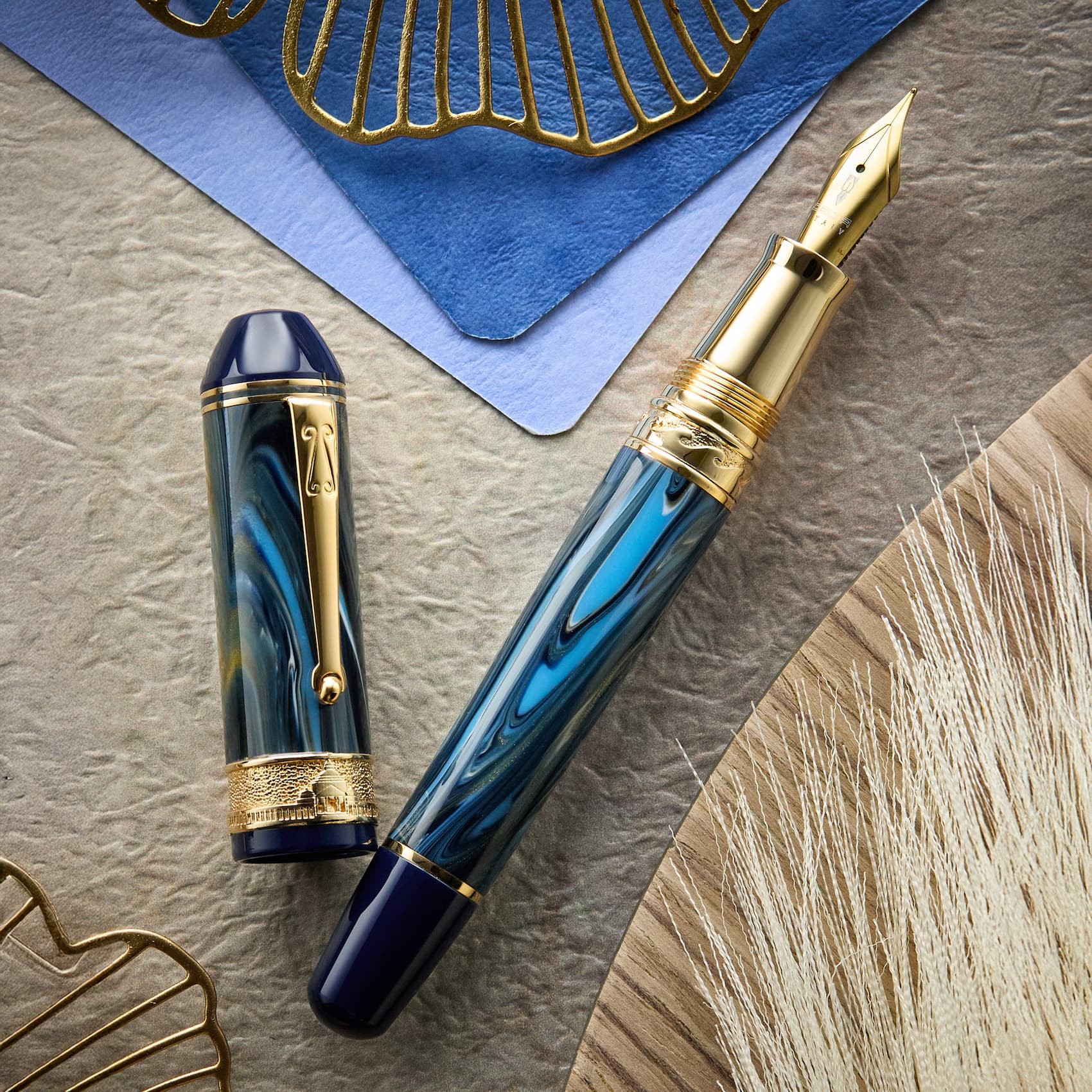 an image of a pen and a notebook on a table