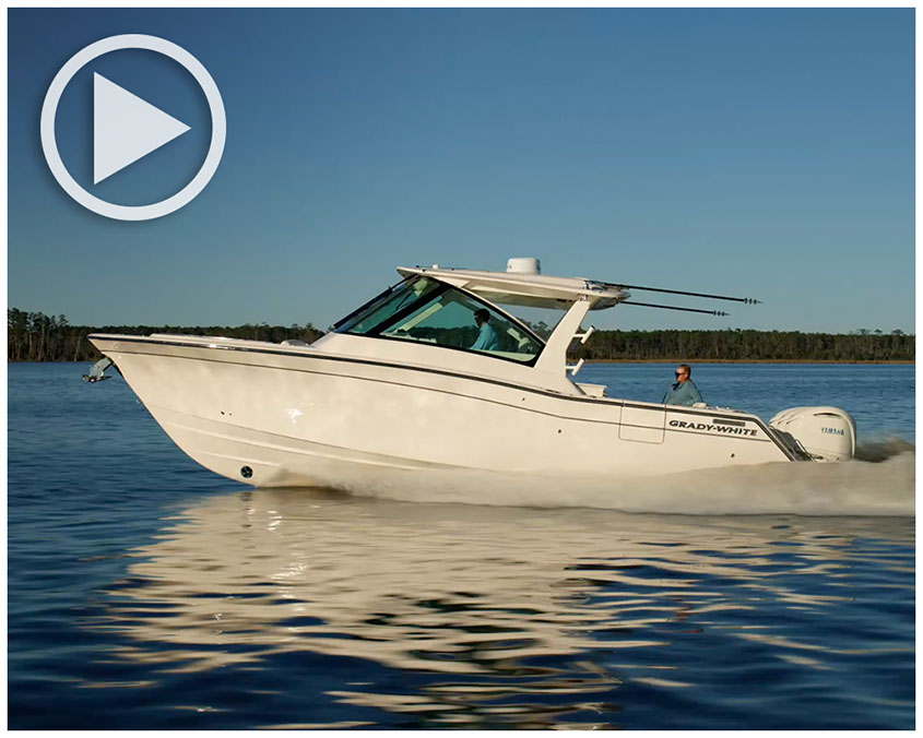 Freedom 345 dual console boat cruising port side