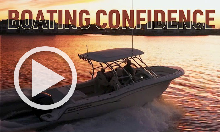 Grady-White boat running at sunset - text in image reads Boating Confidence