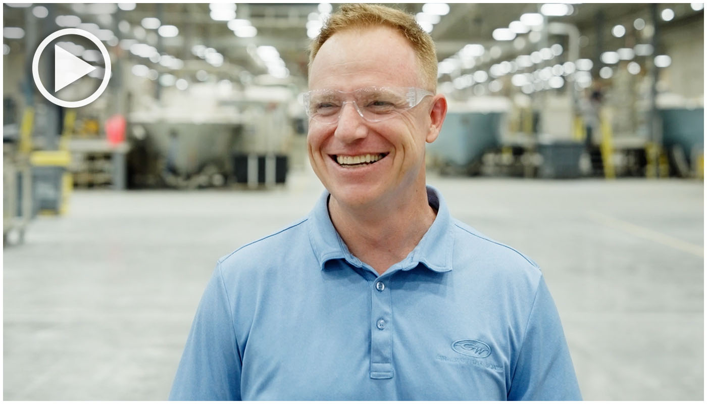 Grady-White Executive Vice President, Jonathon Burns, smiling while being interviewed in the Grady-White factory.