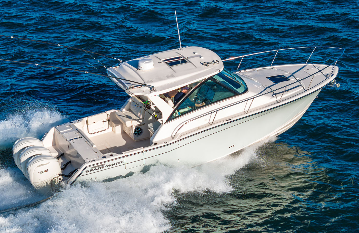 Express 340 express cabin boat running starboard side overhead