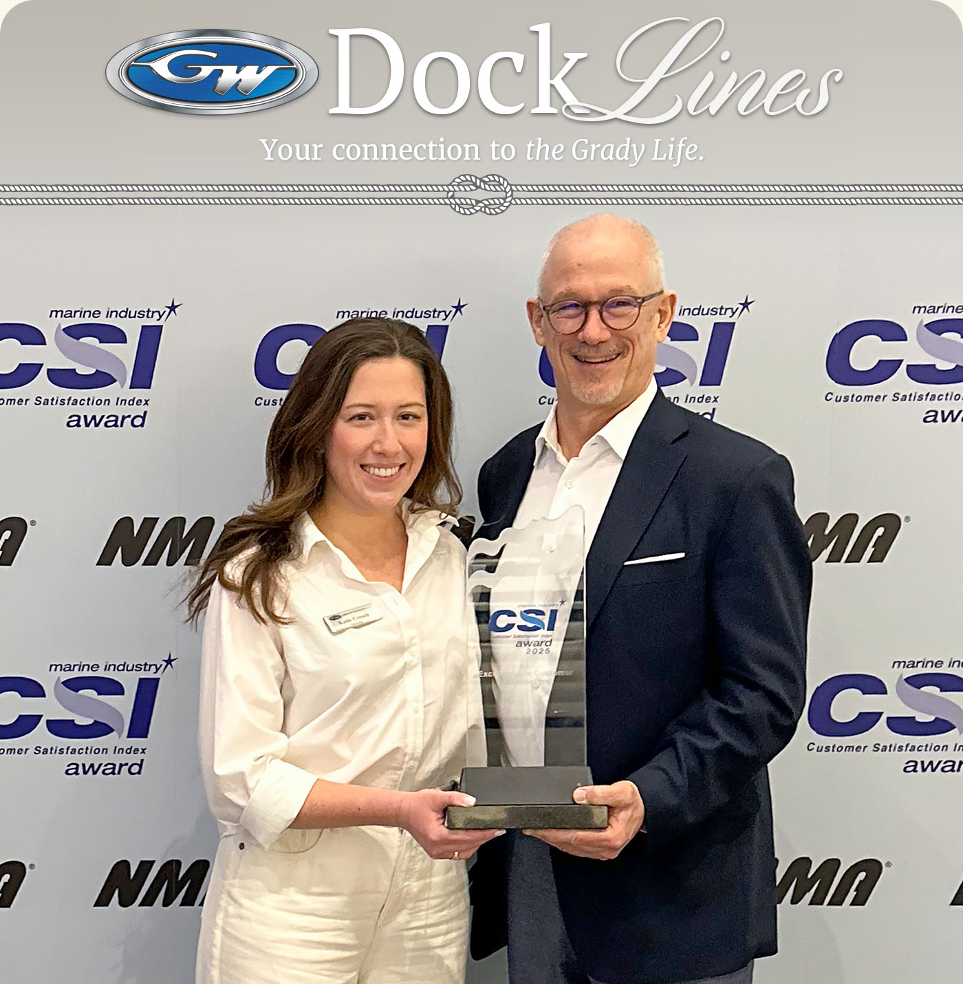 Katie Creech, Grady-White Boats Marketing Supervisor (left), accepts the National Marine Manufacturers Association’s 2025 Customer Satisfaction Index Award from National Marine Manufacturer Association President and CEO Frank Hugelmeyer (right).