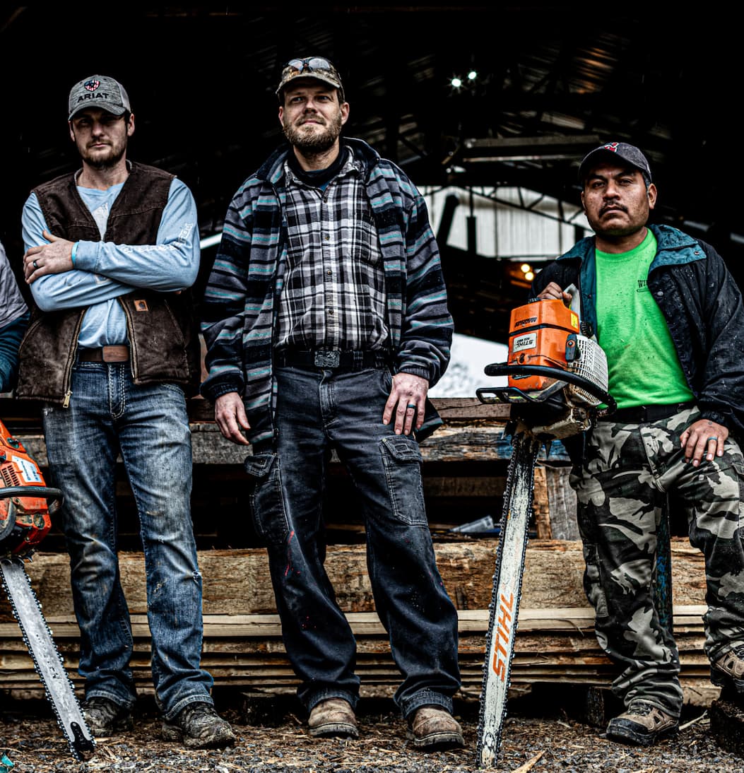 Photograph of lumber workers wearing Groove products.