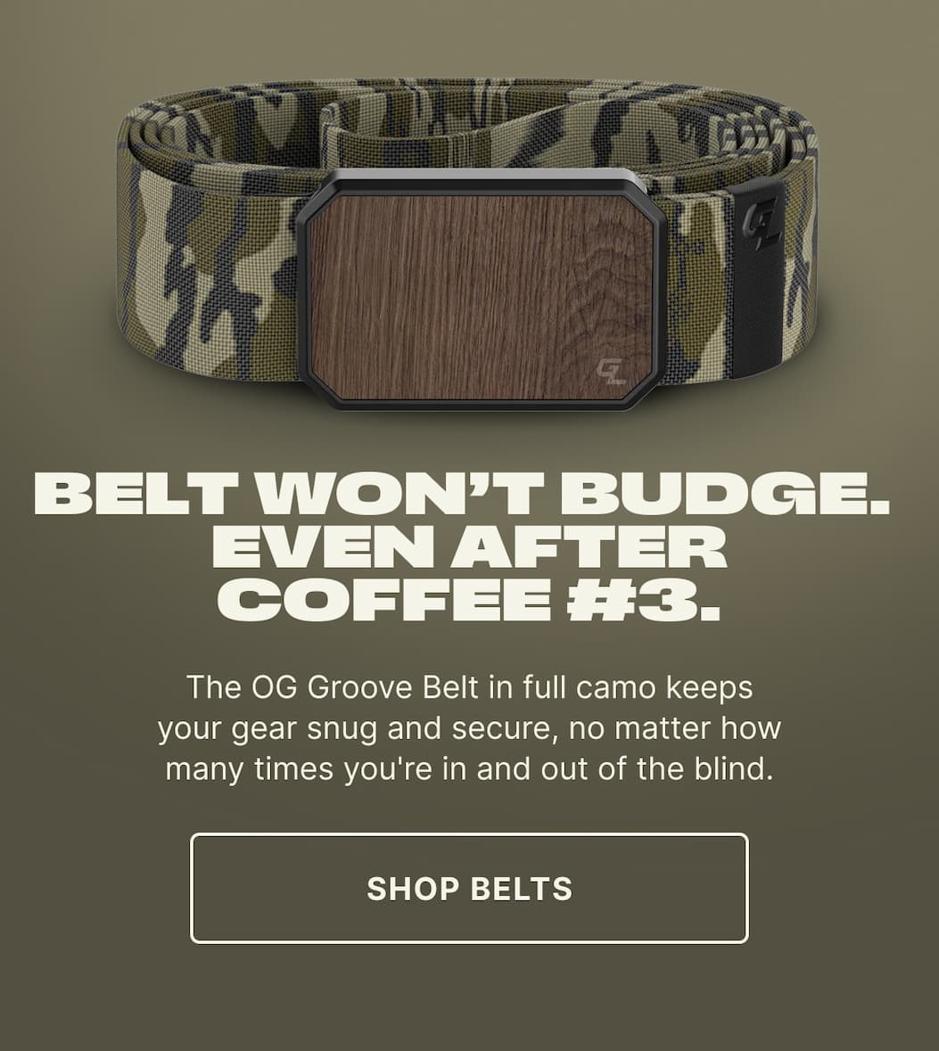 Belt Won’t Budge.  Even After Coffee #3. The OG Groove Belt in full camo keeps your gear snug and secure, no matter how many times you're in and out of the blind. - SHOP BELTS