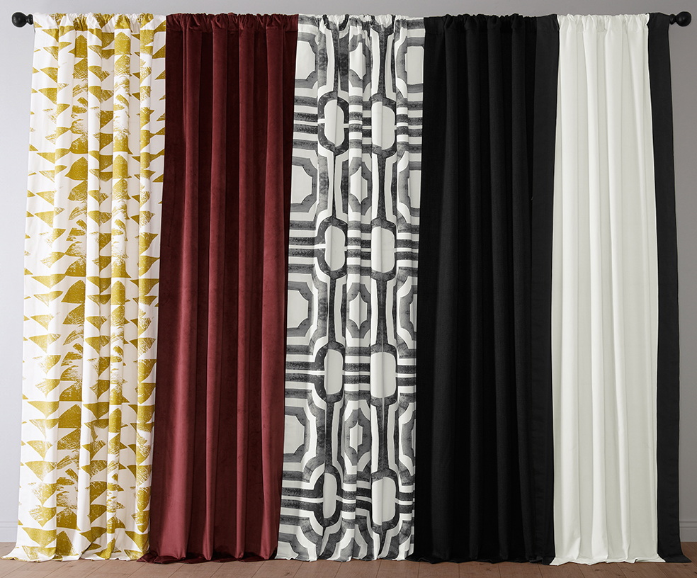 Set of five different curtain panels displayed side by side. From left to right: white with gold geometric leaf pattern, solid deep burgundy velvet, white with bold black geometric pattern, solid black, and solid white. All curtains are hung on a single rod against a gray wall.