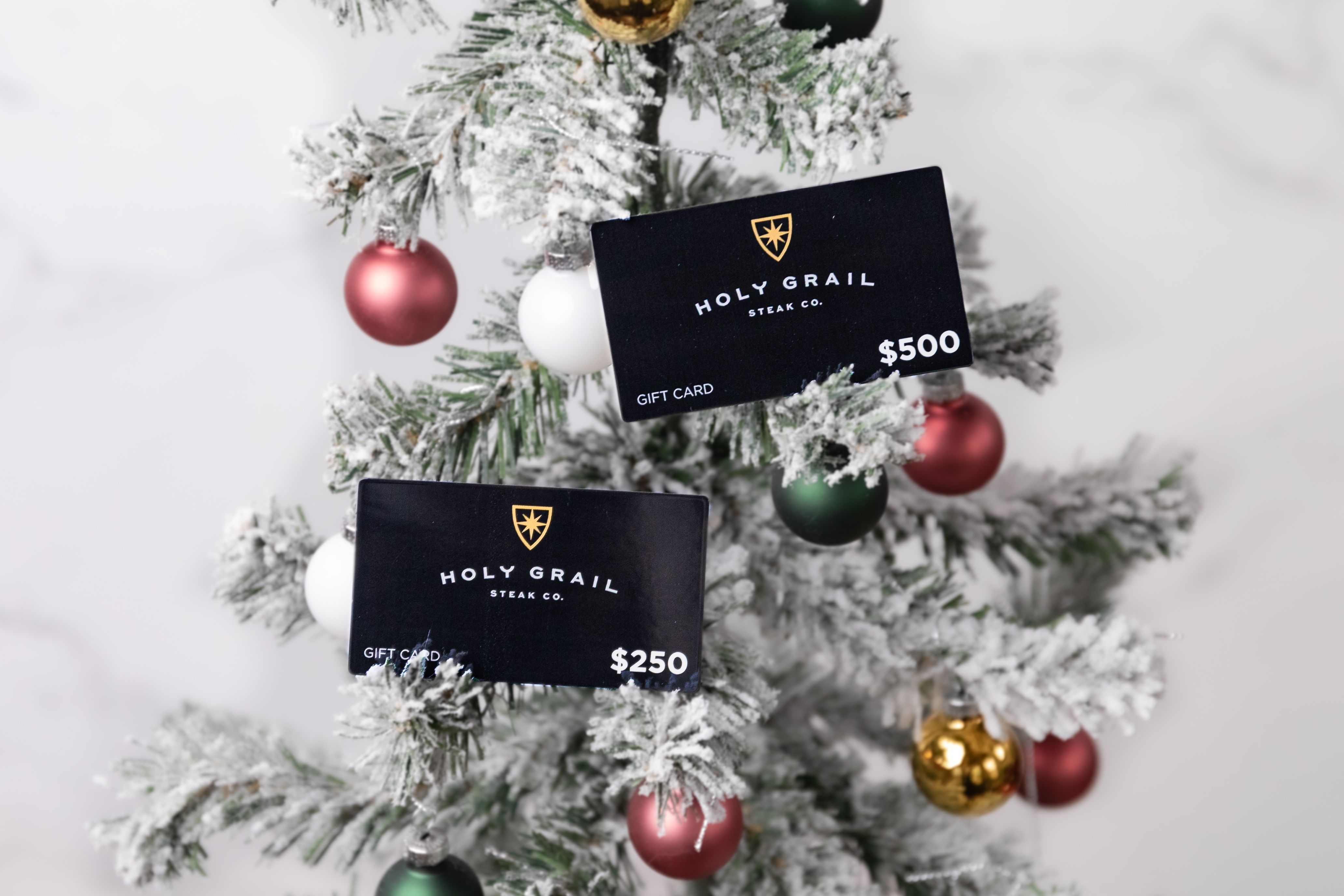Holy Grail gift cards in a Christmas tree