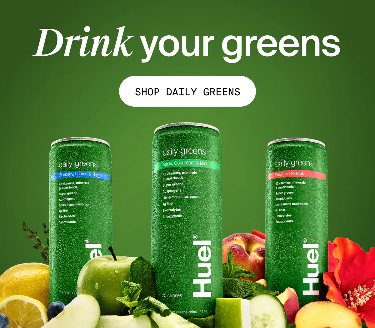 Three Huel Daily Greens cans with fruits and herbs; flavors shown with 'Drink your greens' and shop callout.