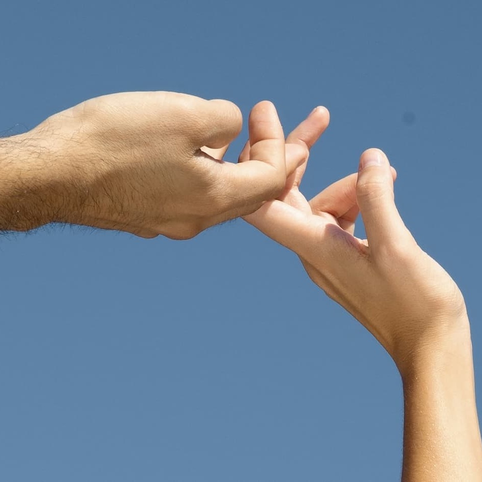 image of two hands