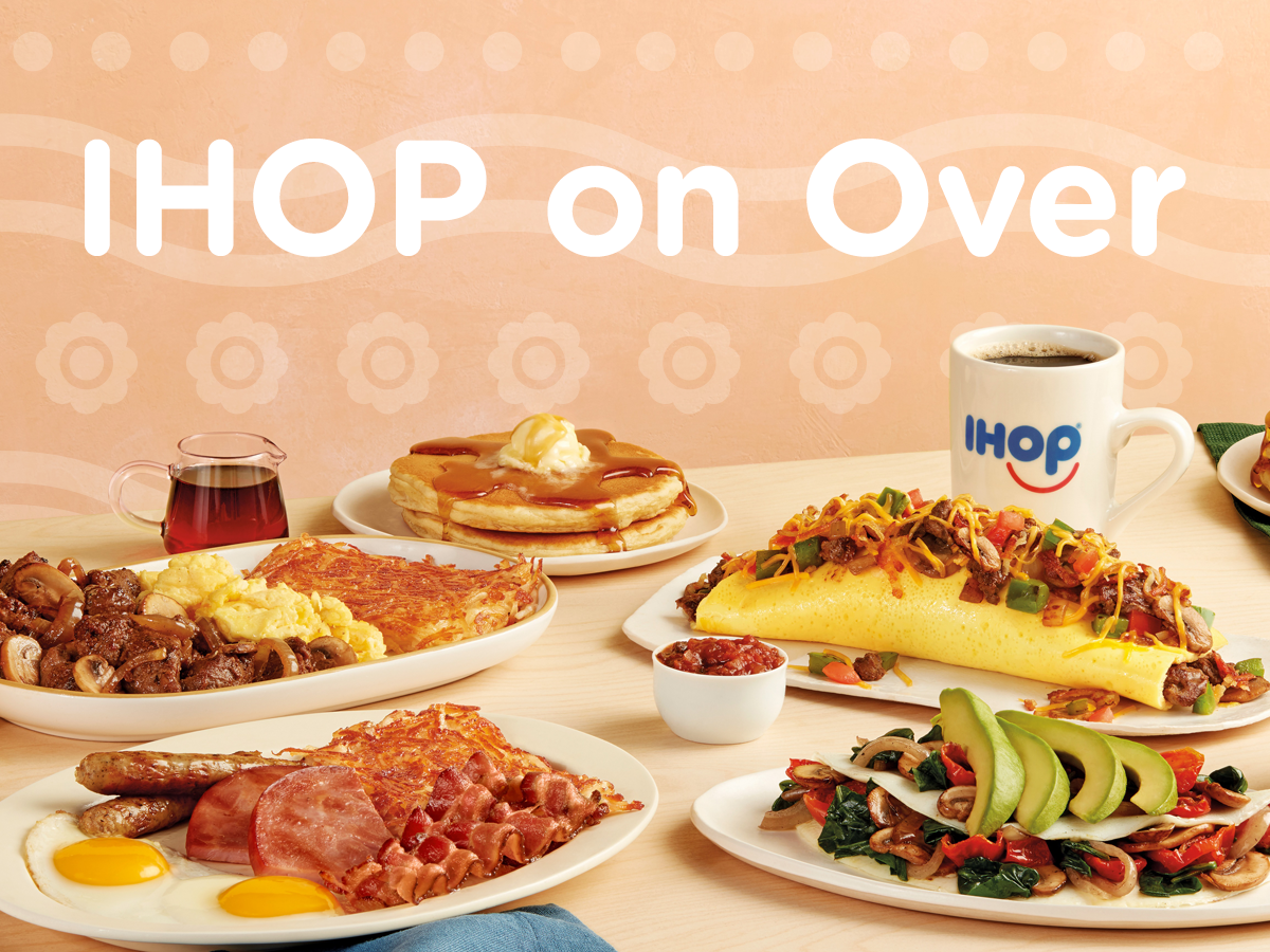 A spread of several IHOP dishes including pancakes and omelettes.