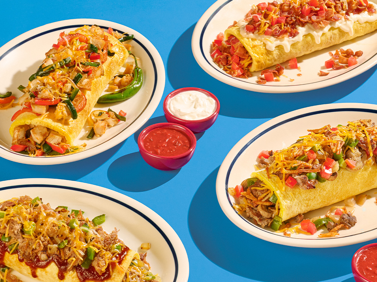 IHOP omelettes on plates set against a blue background.