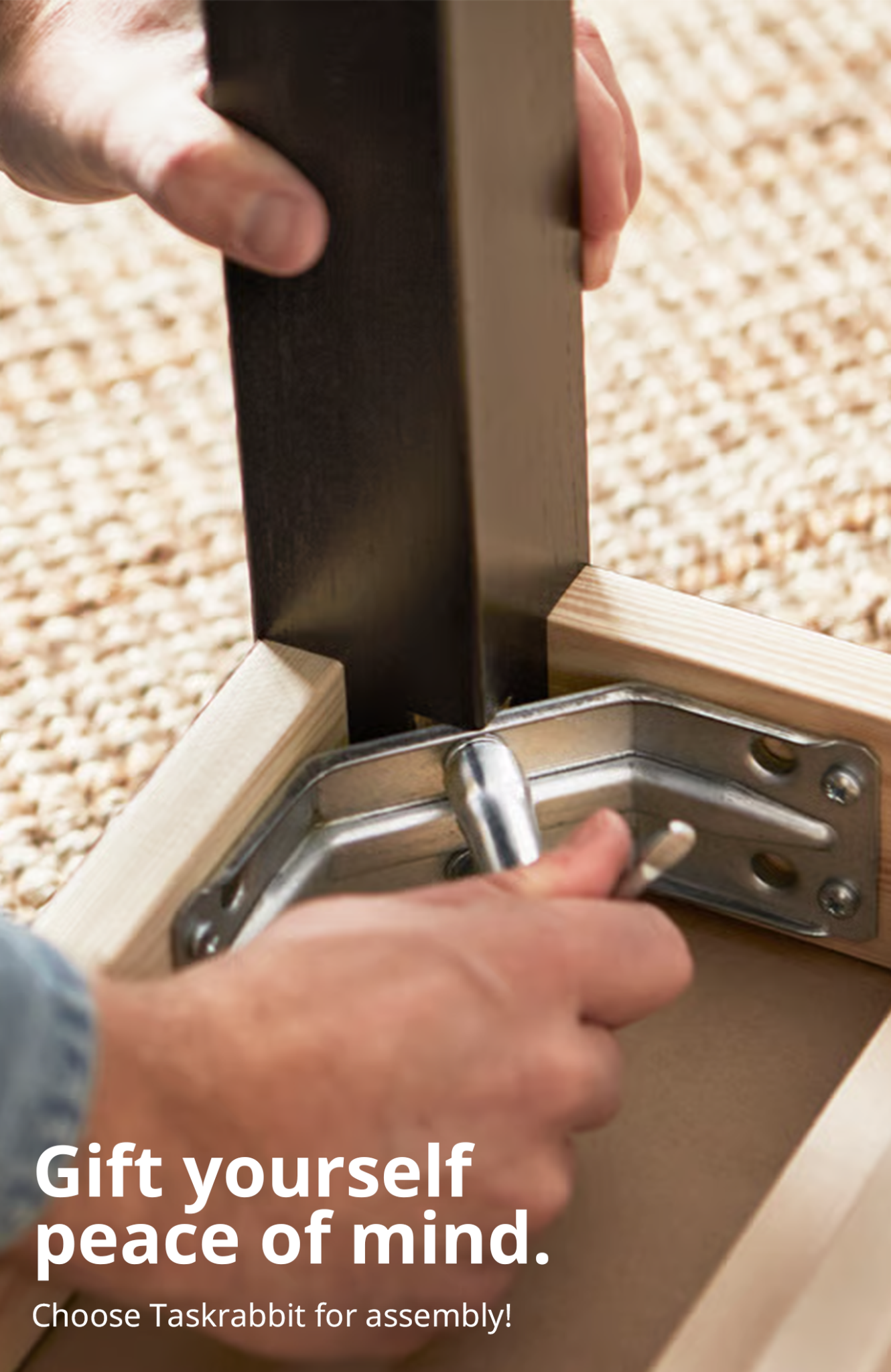 Person building a desk leg