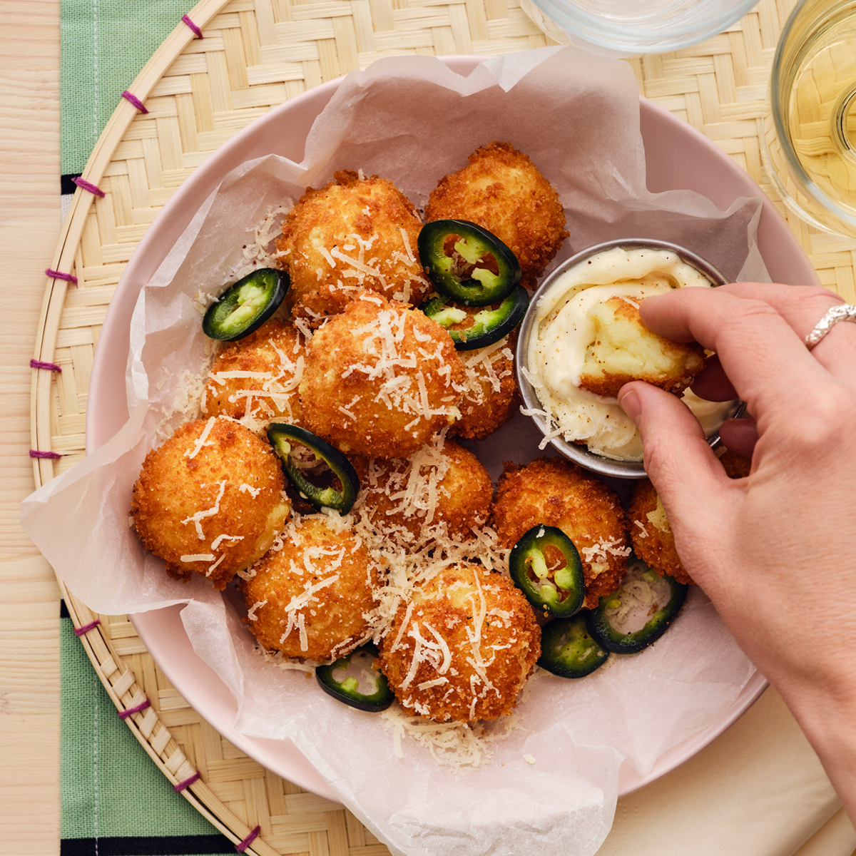 Bowl of potato croquettes and dip.
