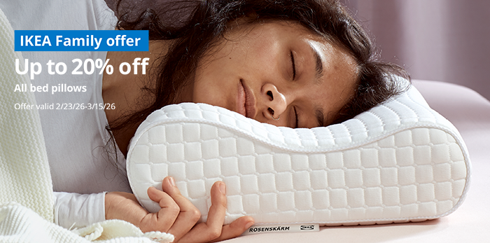 Woman sleeping on IKEA ergonomic bed pillow