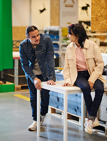 couple shopping the as-is section in IKEA store