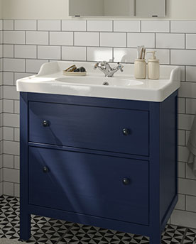 Blue HEMNES bathroom vanity with RUTSJÖN sink.