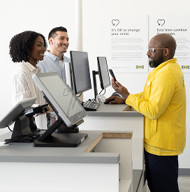 Two people picking up their IKEA order