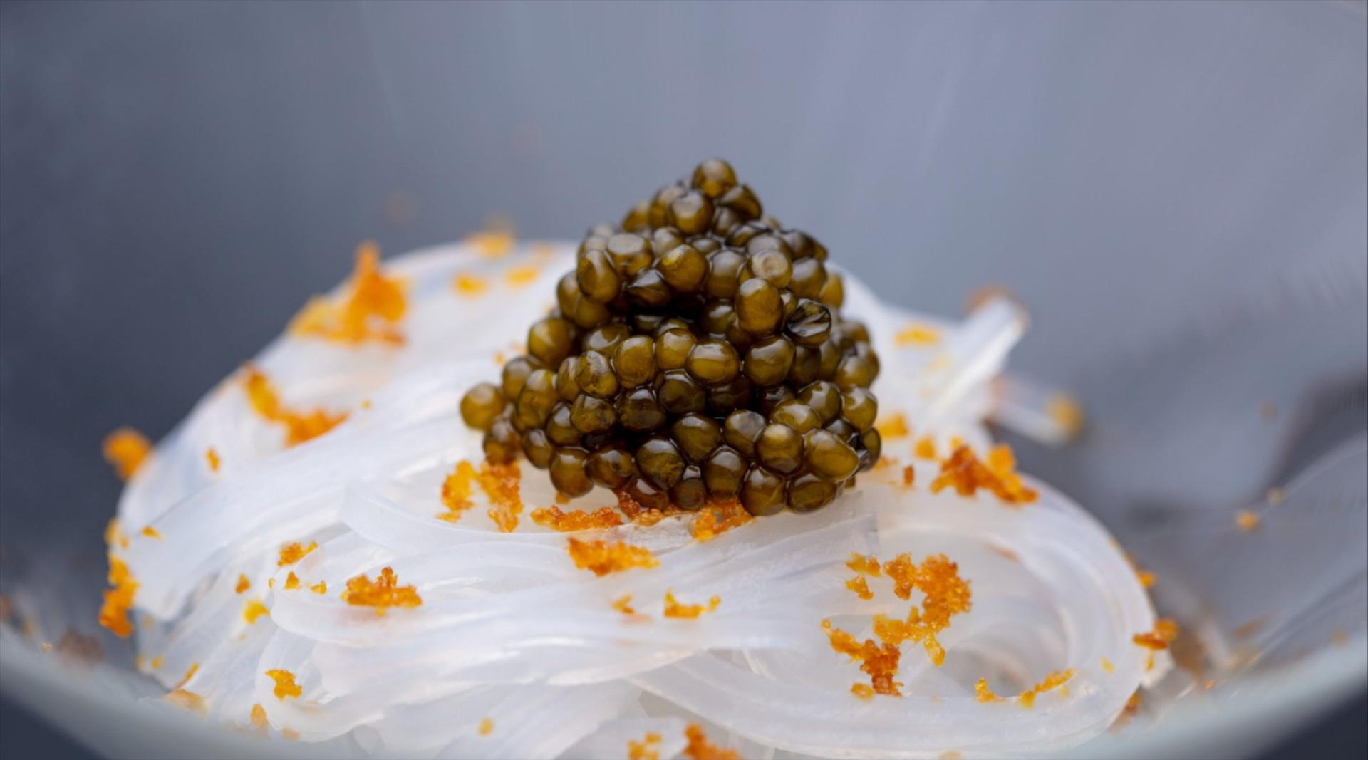 Caviar topped glass noodles