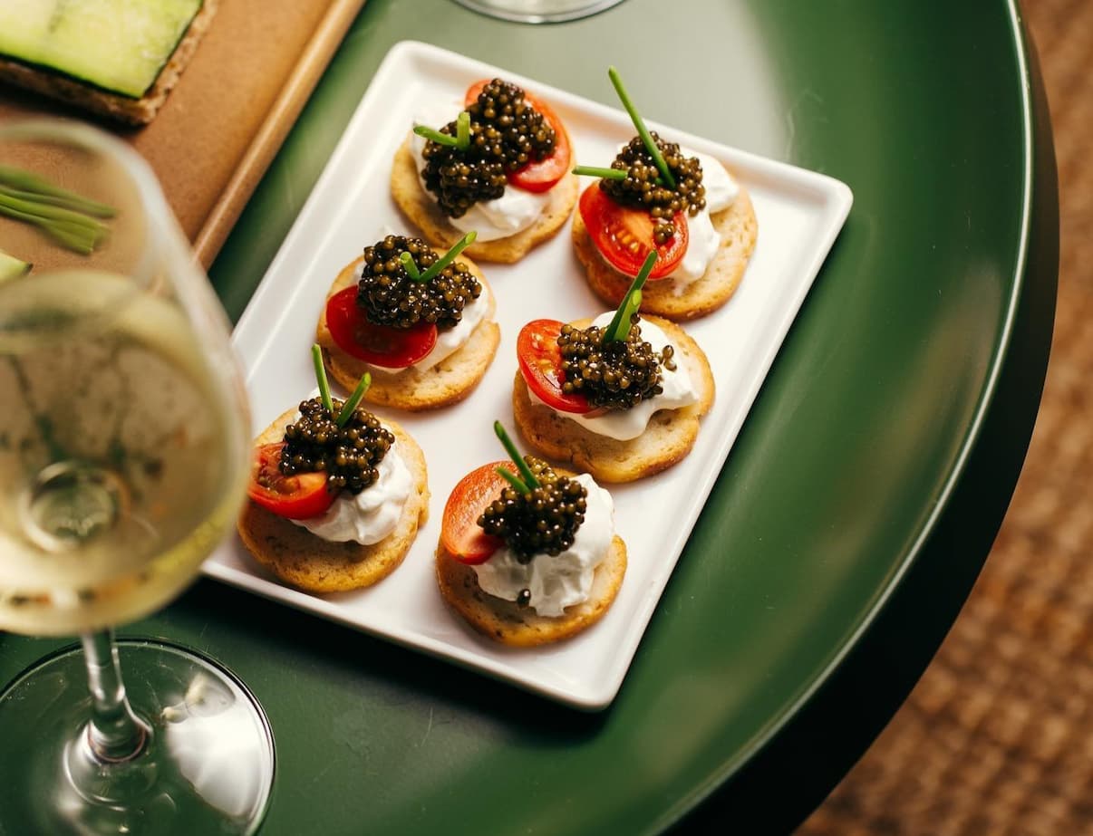 Caviar bites paired with white wine