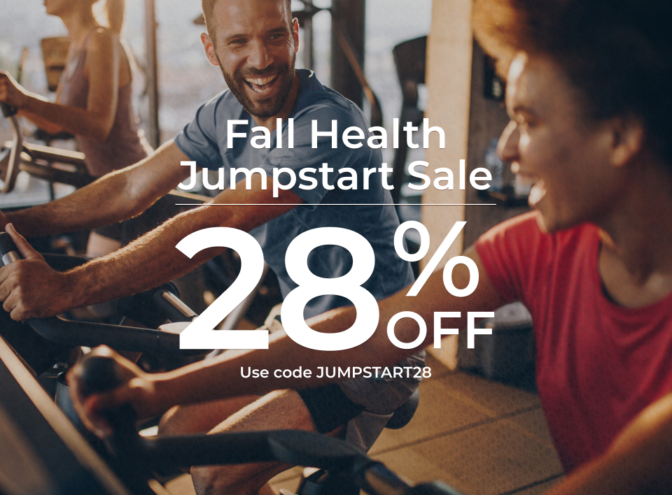 Fall Health Jumpstart Sale – 28% Off. Use code JUMPSTART28. Banner image of a man and woman on stationary bikes in a gym with bold promotional text overlay. Use code JUMPSTART28