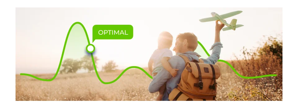 Father and kid hiking in a dry field.  Father is holding a toy airplane.  There is a green graph line with a data point that says Optimal. 
