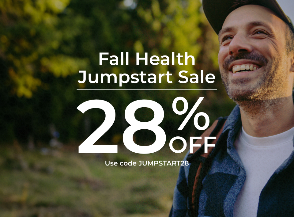 Fall Health Jumpstart Sale. 28% Off.  Use code JUMPSTART28.  Smiling man in baseball hat hiking with backpack. 