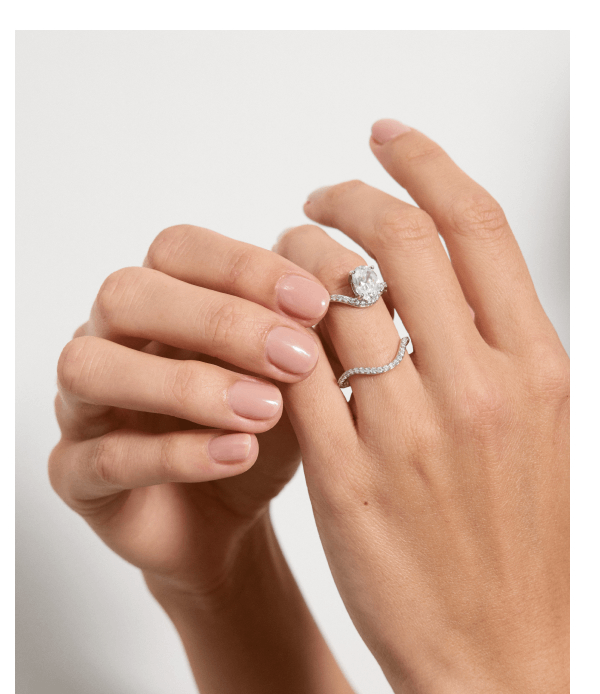 Rings sculpted by motion, made for a timeless wedding and engagement style.
