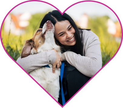 Woman hugging her dog